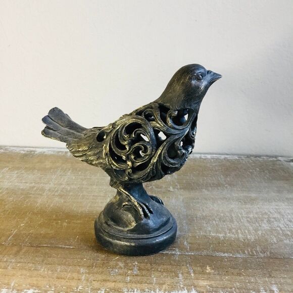 Brown and gold bird with hollow body with scrolls on a round base figurine decor - Picture 1 of 6